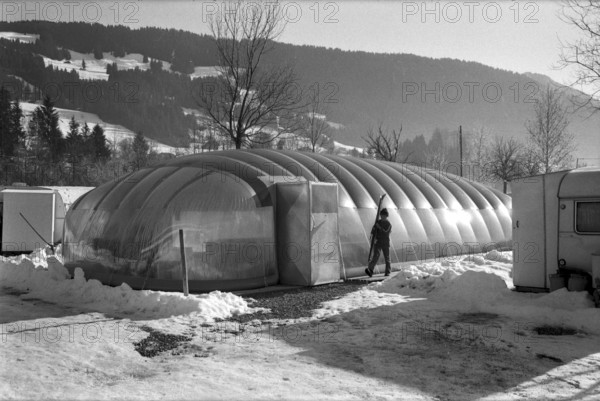Swimming pool becomes indoor pool thanks to inflatable plastic roof, Zweisimmen 1971