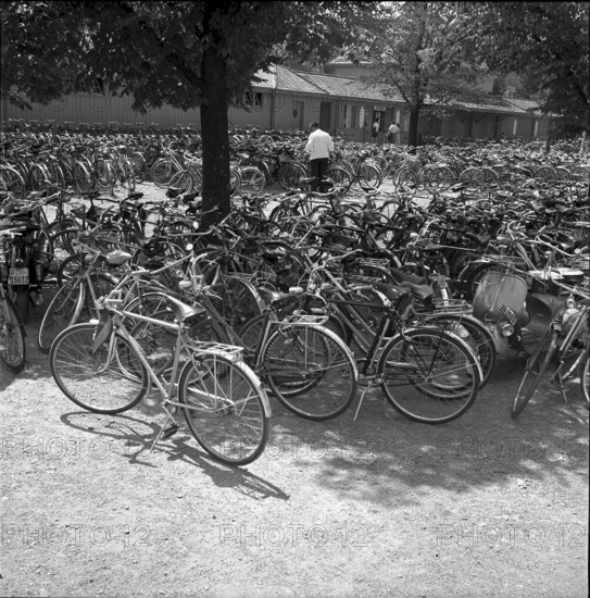 Bicycles parked at the entrance to a seaside swimming bath in Zurich 1952