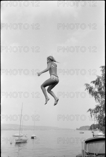Children jumping into the lake, 1972