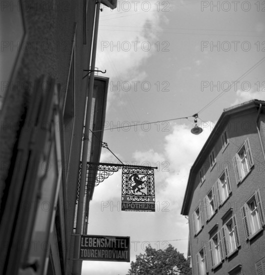 wrought-iron pharmacy shop sign in Bienne 1942