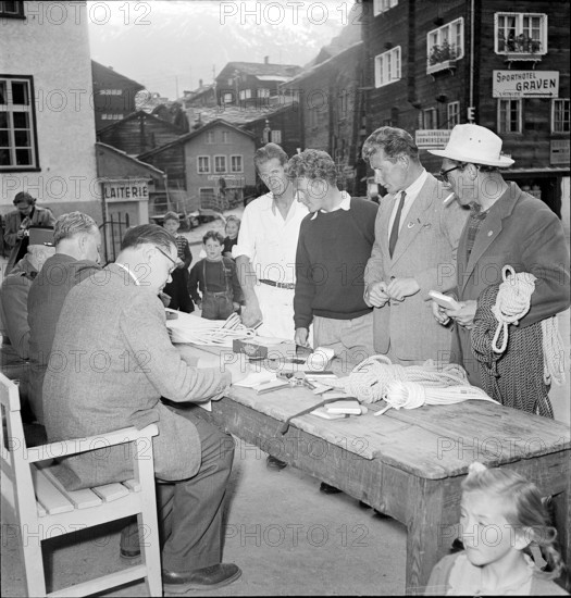 Mountain guide inspection, Zermatt 1952: certificate is stamped, stamping