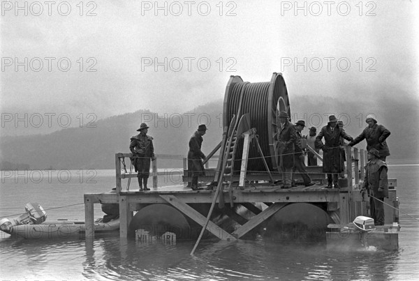 Installation of a telephone cable into Silsersee, 1963