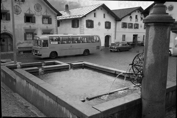 Fountain at village square in Scuol GR