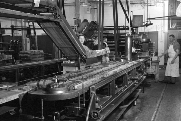 Workers in chocolate factory Suchard in Serrieres, 1942