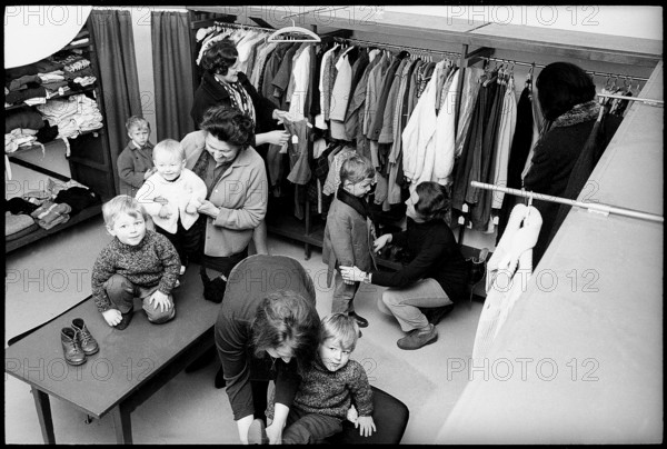 Shopping at a second hand clothes shop, 1968