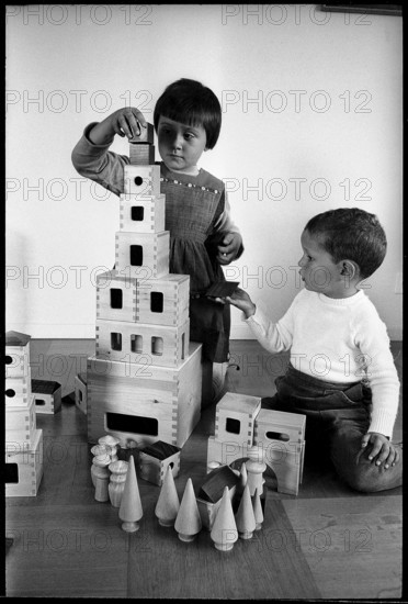 Children playing with building bricks, 1968