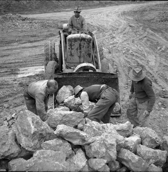 Stones to rebuild dykes after flooding in Holland, stone quarry Lagern, 1953