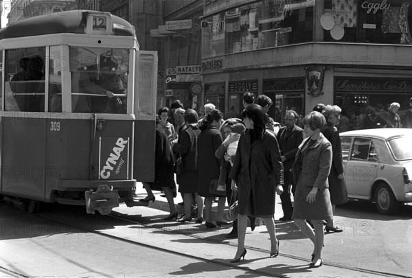 Woman crossing a road in Geneva 1966