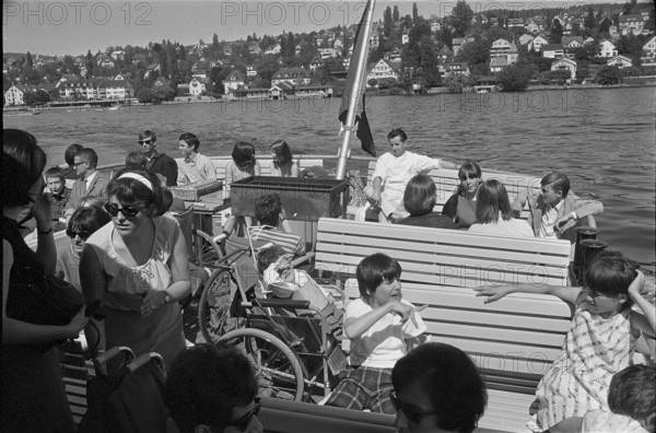 Disabled children go for an outing, invited by the St Nicholas association 1967