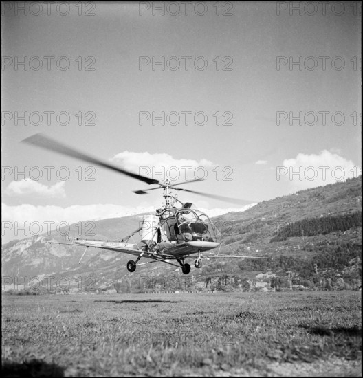 Crop duster spraying insecticide to combat cockchafer in Valais 1957