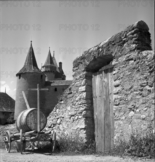 Wine barrel on handcart at Aigle Castle, 1954