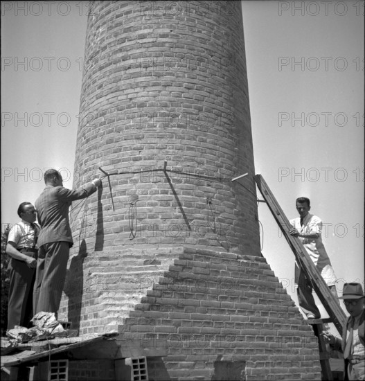 Factory chimney blasting in Geneva: fuse attachment, 1943