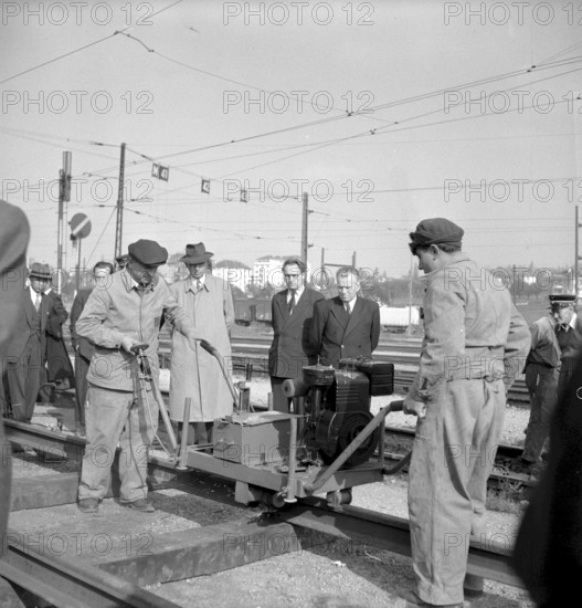 Study trip: russian construction experts visiting railway line construction site in Renens 1951