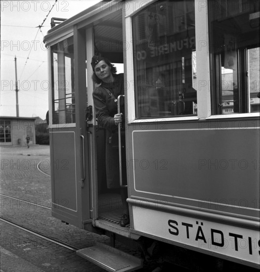Ticket collector of Zurich tram, around 1939