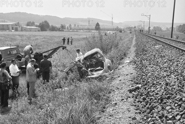 Two dead people on a unguarded railroad crossing near Bonstetten, 1971