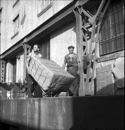 Dockers loading goods, Rhine port, Basle 1948