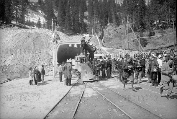 Guests and miners celebrate the San Bernardino tunnel break through, 1965