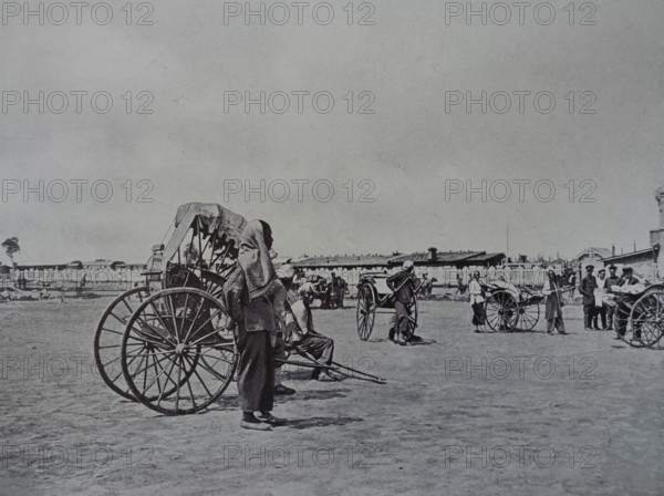Scenes from Chinese life A rickshaw (Chinese driver) in Harbin