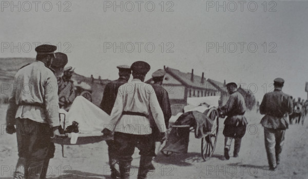 Carrying the wounded near Liaoyang Photo by Gusev