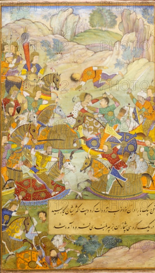 Babur's cavalry fighting Tanbal's troops