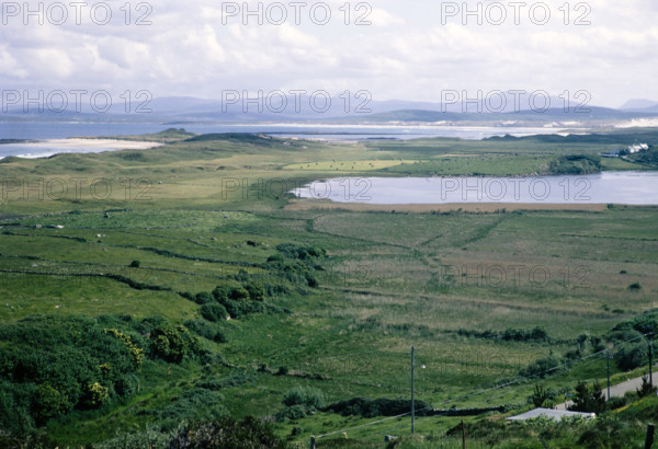 Coastal landscape over Clooney Lake from village of Portnoo.