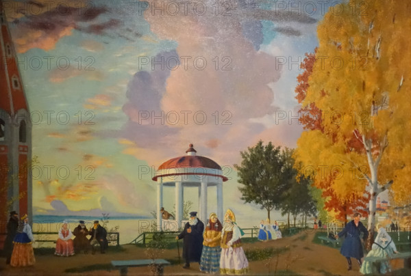 Merchants walk along the shore of the Volga river