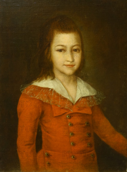 Portrait of a boy in a red caftan