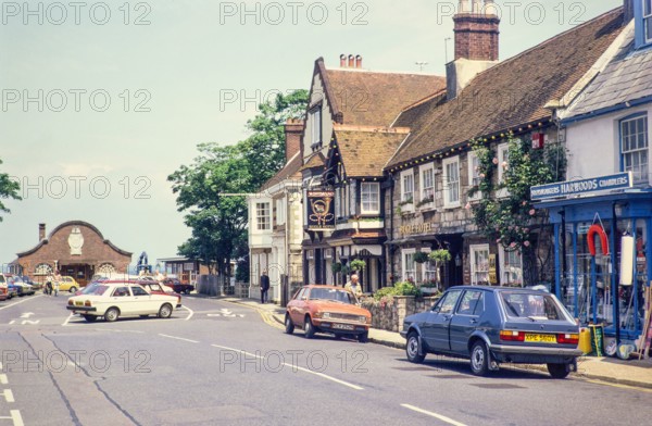 Cars parked outside Bugle Hotel.