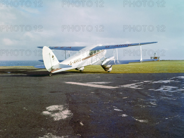 British European Airways G-AHKU De Havilland DH.89A Dragon Rapide 6 aircraft service from Land's End airport to the Scilly Isles.