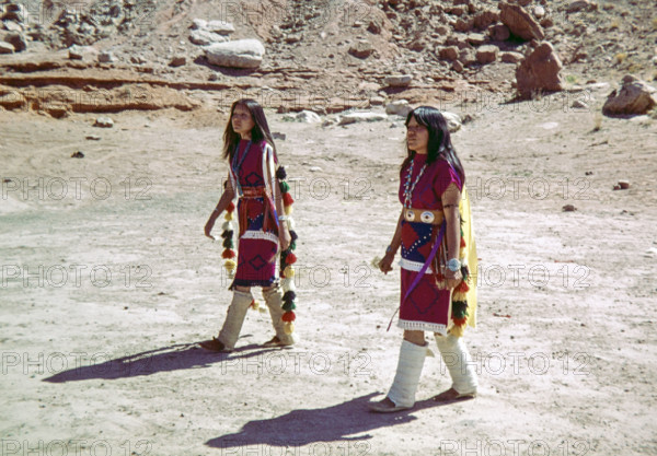 Two Hopi Women wearing traditional ceremonial dress.