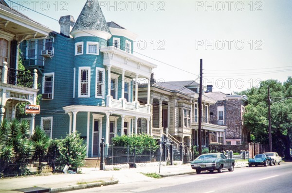 Striking blue Victorian house.