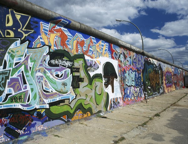 GERMANY, Berlin,  Berlin Wall, Preserved section with graffitti