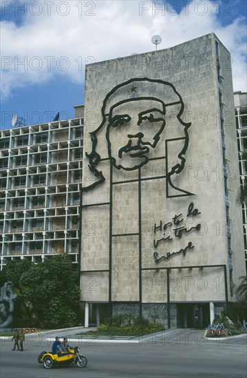 CUBA, Havana Province, Havana, Communist Party HQ in Revolution Square with iron mural of Che Guevara on the front wall
