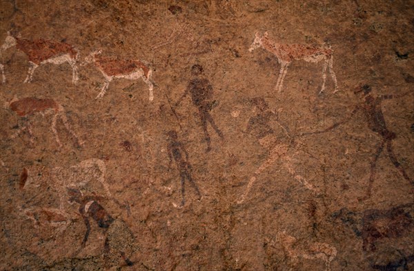NAMIBIA, General, Bushman rock painting depicting men with spears and cattle