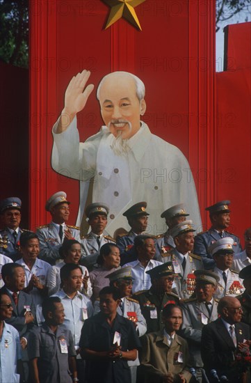 VIETNAM, Ho Chi Minh City , Liberation of Saigon 10th anniversay celebration. Generals standing infront of poster of Ho Chi Minh.