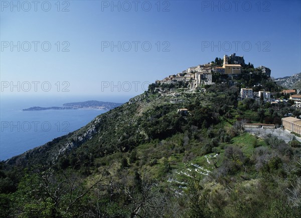 FRANCE, Alpes-Maratimes, Eze, Hilltop town with Cap Ferrat in the distance.