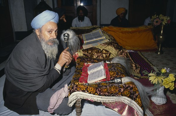 INDIA, Patna, Continuous reading of the Guru Granth Sahib Sikh holy book.