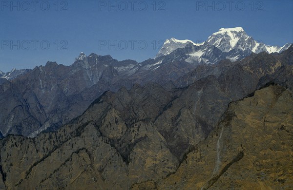 INDIA, Uttar Pradesh, Himalayas, Mountain landscape showing folds in the Himalayas and peaks and ridges.