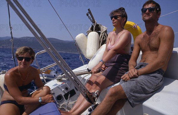 10045185 SPORT Water Yachting Men and women sailing in Greece