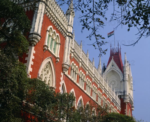 INDIA, West Bengal , Calcutta, Town Hall.  Angled view of red and white exterior.