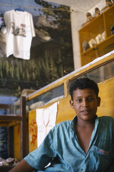 EGYPT, Children, Teen boy in shop