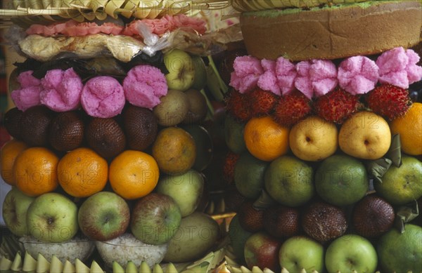 INDONESIA, Bali, Ubud, Temple offerings of fruit arrangements