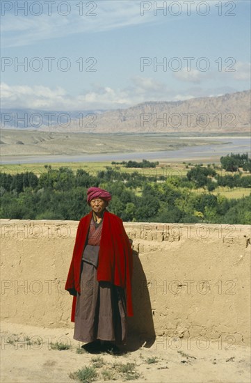 CHINA, Quinghai Province, Tibetan monk living in remote area by the Yellow River near Guide.