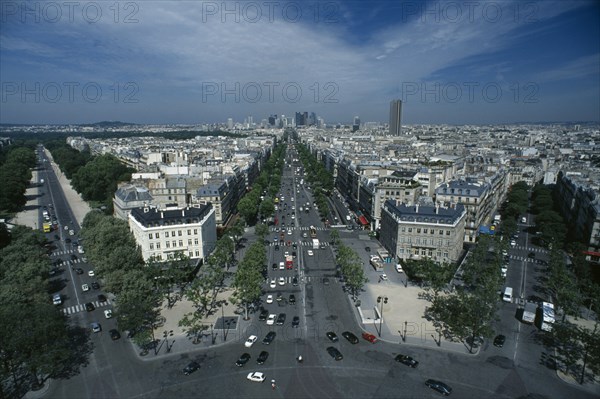 FRANCE, Ile De France, Paris, A view over the city and down the Avenue de la Grande Armee and Avenue Foch towards La Defence from the top of the Arc de Triomphe