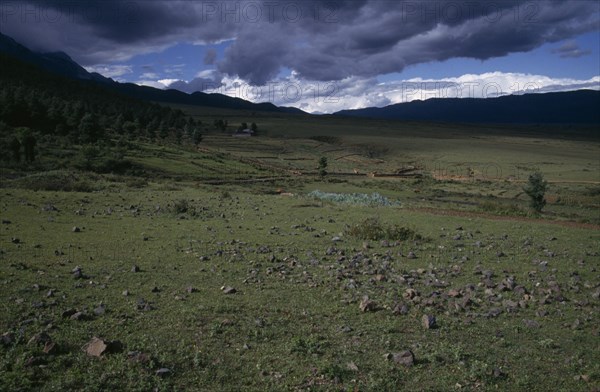 CHINA, Yunnan, Near Lijiang, "Landscape at the foot of Jade Dragon Snow Mountain, also known as Mount Satseto"