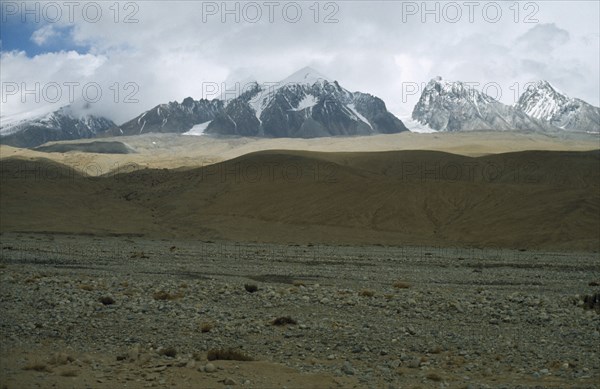 CHINA, Xinjiang , Mountains and barren landscape near Mustagh Ata.