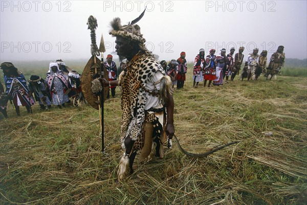 SOUTH AFRICA, KwaZulu Natal , Tugela, Local man in leopard skin officiating at Sangoma graduation ceremony.