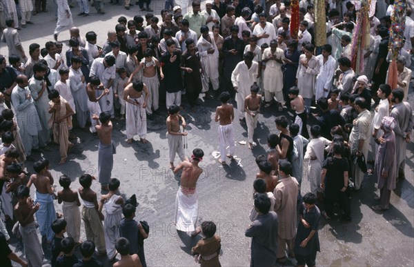 PAKISTAN, N W Frontier Province, Peshawar , "Mohurrum Shia muslim festival held during the first month of the Islamic calendar to commemorate the death of Husayn ibn Ali, the grandson of Muhammad."