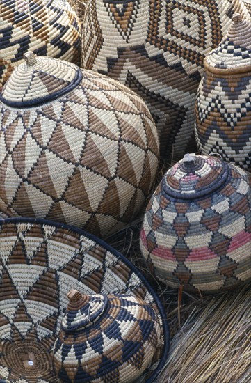 SOUTH AFRICA, Zululand  , Baskets woven by Zulu women from Lala palm and died with juices of tree roots.