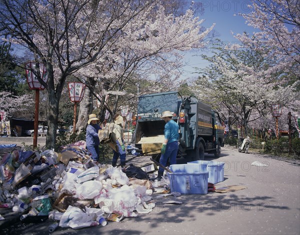 JAPAN, Honshu, Kyoto, Maruyama Park rubbish collection during Cherry Blossom season